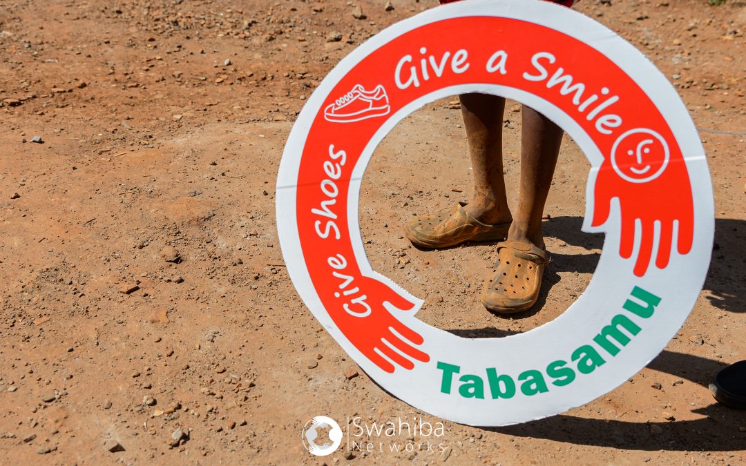 Tabasamu give shoes give a smile